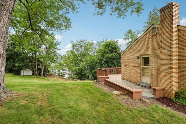 106 Crestline Dr, Ross Twp, PA 15237 - view of green lawn featuring a shed and a wooden deck