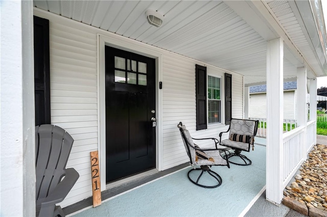 221 Connoquenessing Main St, Connoquenessing Boro, PA 16027 - doorway to property featuring a porch