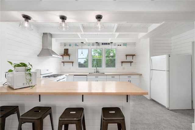 221 Connoquenessing Main St, Connoquenessing Boro, PA 16027 - kitchen with wall chimney range hood, white appliances, beam ceiling, white cabinetry, and open shelves