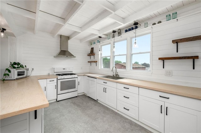 221 Connoquenessing Main St, Connoquenessing Boro, PA 16027 - kitchen featuring wall chimney range hood, white appliances, open shelves, butcher block counters, and wooden walls