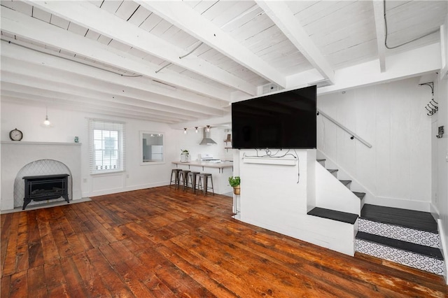 221 Connoquenessing Main St, Connoquenessing Boro, PA 16027 - living room with hardwood / wood-style floors, stairs, a fireplace with flush hearth, and a wooden ceiling with exposed beams