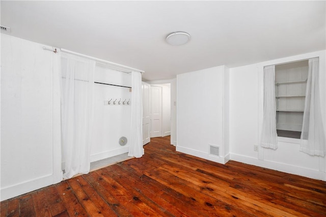 221 Connoquenessing Main St, Connoquenessing Boro, PA 16027 - unfurnished bedroom featuring wood-type flooring and baseboards