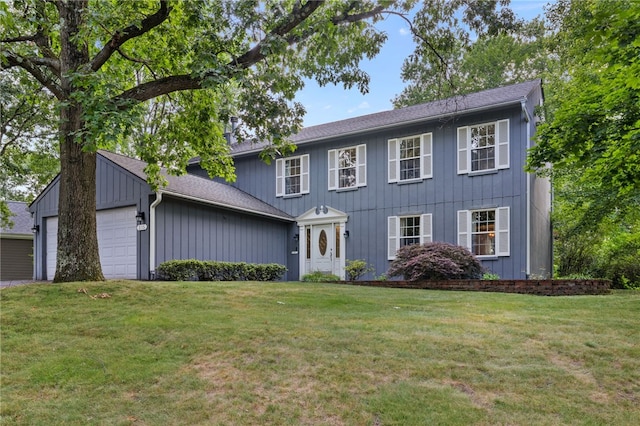 215 Lafayette Dr, Cranberry Twp, PA 16066 - colonial home with a garage, a front lawn, and a shingled roof