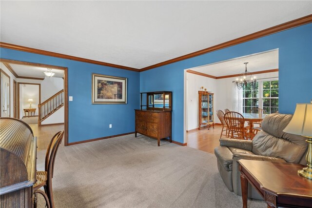 215 Lafayette Dr, Cranberry Twp, PA 16066 - carpeted living area featuring a chandelier, crown molding, and stairs