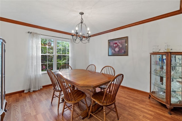 215 Lafayette Dr, Cranberry Twp, PA 16066 - dining space featuring a chandelier, crown molding, and light wood finished floors