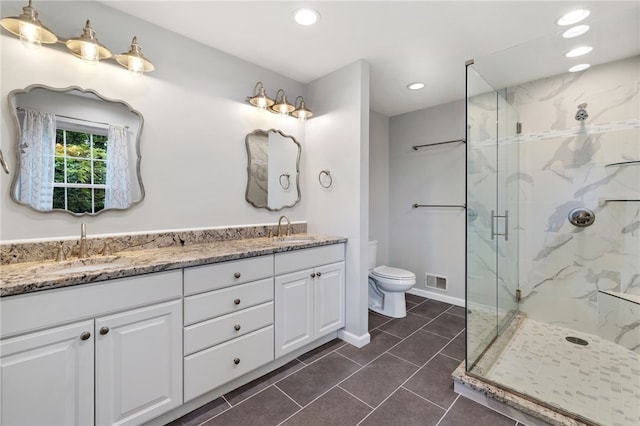 215 Lafayette Dr, Cranberry Twp, PA 16066 - bathroom with a marble finish shower, double vanity, recessed lighting, and tile patterned flooring