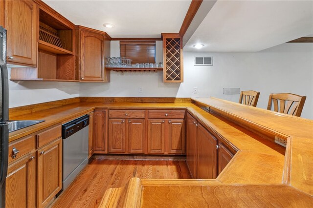215 Lafayette Dr, Cranberry Twp, PA 16066 - kitchen with dishwasher, open shelves, light wood-style floors, recessed lighting, and brown cabinetry