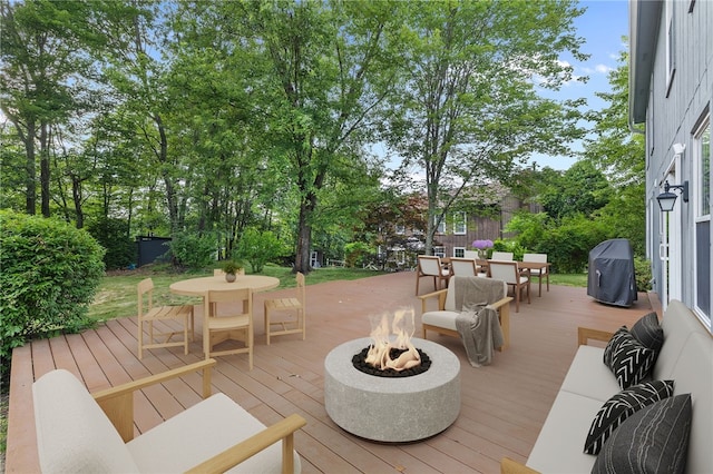 215 Lafayette Dr, Cranberry Twp, PA 16066 - deck featuring outdoor dining space, a fire pit, grilling area, and view of scattered trees