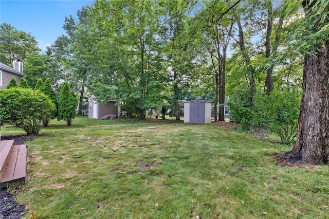 215 Lafayette Dr, Cranberry Twp, PA 16066 - view of grassy yard with a shed