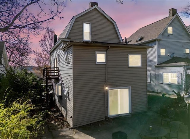 206 7th St, Oakmont, PA 15139 - back of property featuring a chimney and a gambrel roof