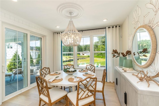 287 Mcmurray Rd, Saint Clair, PA 15241 - dining area featuring a chandelier and light wood-type flooring