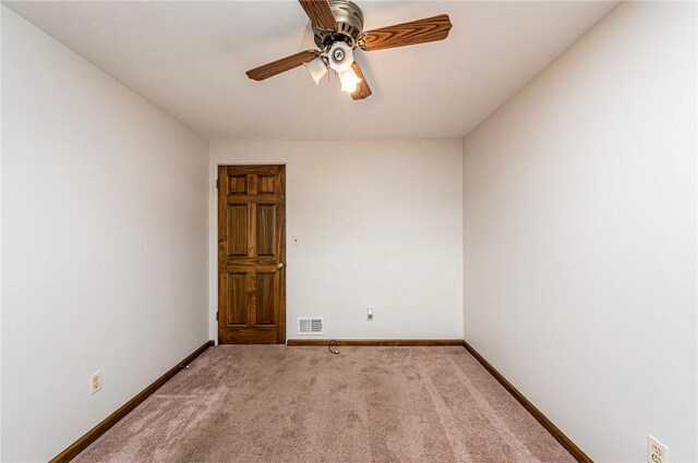 12220 Herold Dr, North Huntingdon, PA 15642 - carpeted spare room with ceiling fan and baseboards