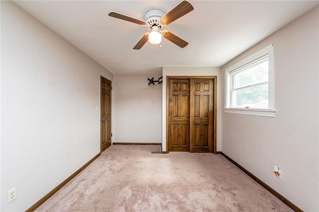 12220 Herold Dr, North Huntingdon, PA 15642 - unfurnished bedroom with light colored carpet and ceiling fan