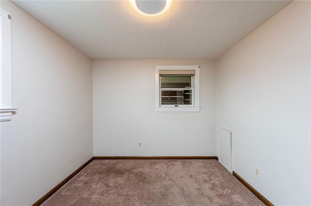 12220 Herold Dr, North Huntingdon, PA 15642 - carpeted empty room featuring baseboards