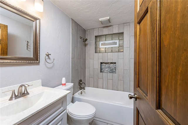 12220 Herold Dr, North Huntingdon, PA 15642 - full bath featuring vanity, a textured ceiling, shower / bath combination, and a textured wall
