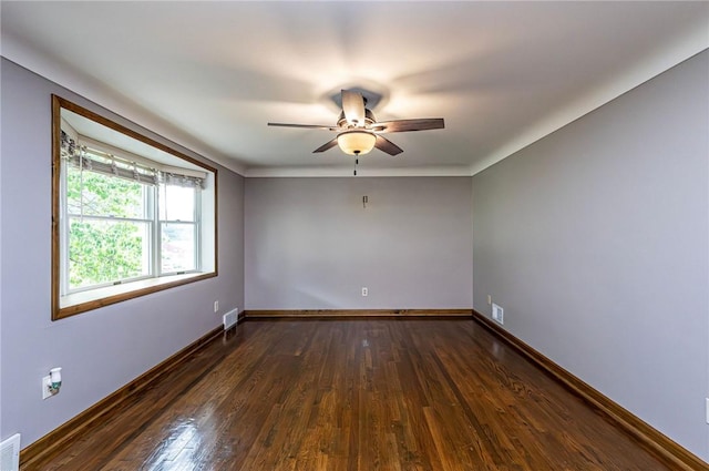 12220 Herold Dr, North Huntingdon, PA 15642 - unfurnished room with ceiling fan and dark wood-style flooring