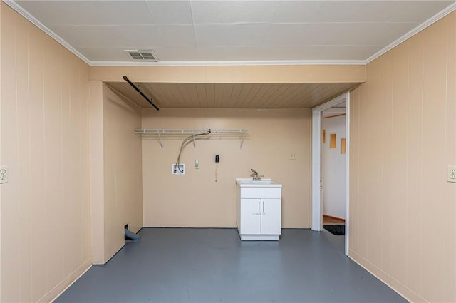 12220 Herold Dr, North Huntingdon, PA 15642 - laundry room with ornamental molding and wood walls