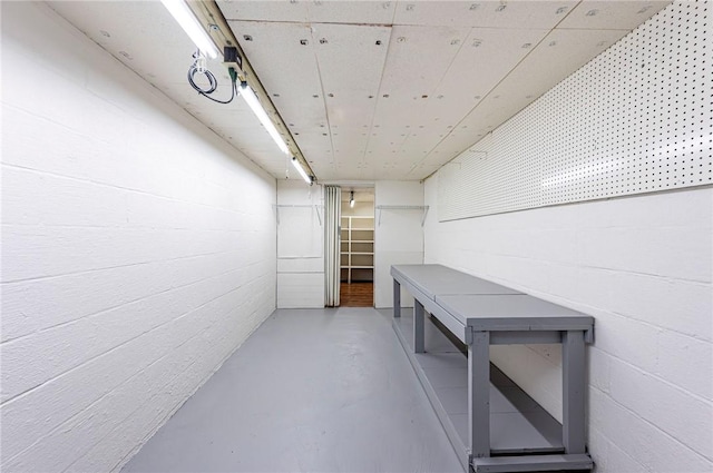 12220 Herold Dr, North Huntingdon, PA 15642 - hall featuring concrete floors and concrete block wall