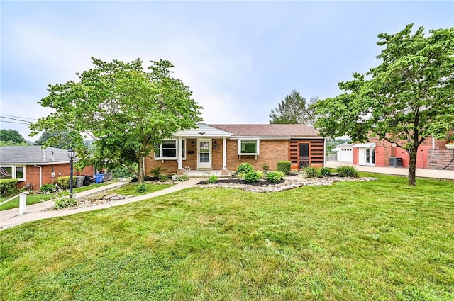 12220 Herold Dr, North Huntingdon, PA 15642 - single story home featuring a front yard, brick siding, and a garage