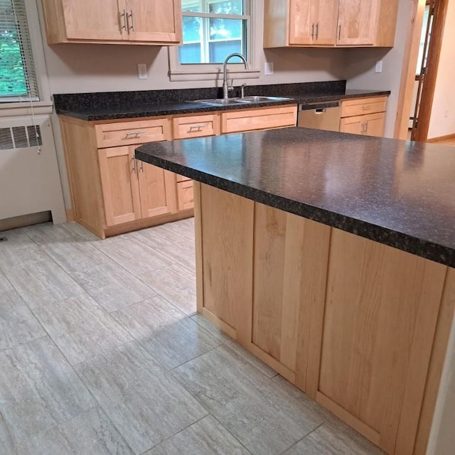 120 Rothen Ave, Twp Of But Nw, PA 16001 - kitchen with radiator, dishwasher, and light brown cabinets