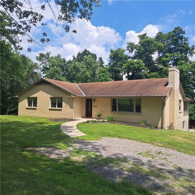 120 Rothen Ave, Twp Of But Nw, PA 16001 - single story home with a front yard, brick siding, and a chimney