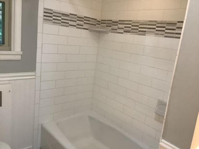 120 Rothen Ave, Twp Of But Nw, PA 16001 - bathroom with shower / bathtub combination and wainscoting