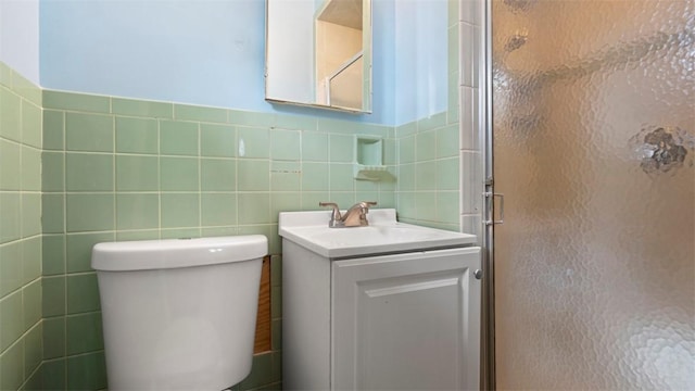 4952 Flamingo Dr, Whitehall, PA 15236 - bathroom featuring vanity, a shower stall, and tile walls