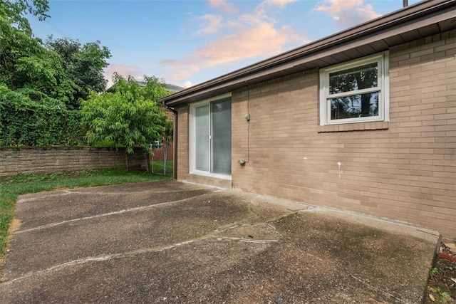 4952 Flamingo Dr, Whitehall, PA 15236 - entrance to property with brick siding and a patio area