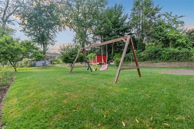 4952 Flamingo Dr, Whitehall, PA 15236 - yard at dusk featuring a playground and a yard