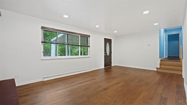 4952 Flamingo Dr, Whitehall, PA 15236 - spare room featuring a baseboard heating unit, wood finished floors, recessed lighting, and stairs