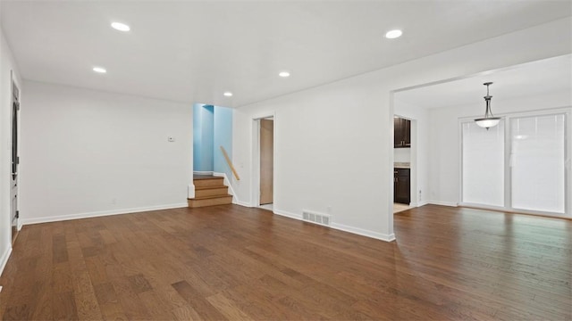 4952 Flamingo Dr, Whitehall, PA 15236 - unfurnished room with stairway, wood finished floors, and recessed lighting