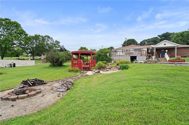 1146 Middletown, Hempfield Twp, PA 15601 - view of yard featuring a gazebo, a fire pit, and a deck