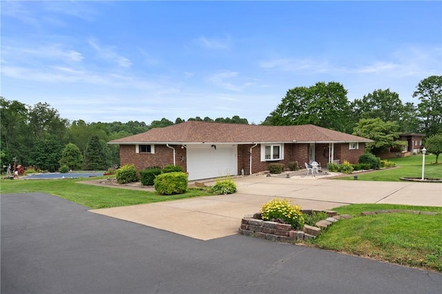 1146 Middletown, Hempfield Twp, PA 15601 - ranch-style home featuring an attached garage, a front yard, driveway, and brick siding
