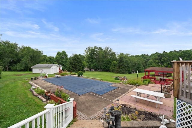 1146 Middletown, Hempfield Twp, PA 15601 - view of swimming pool featuring a yard, a covered pool, a diving board, and an outdoor structure