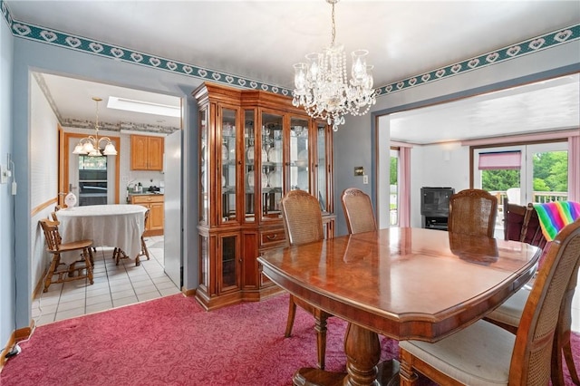 1146 Middletown, Hempfield Twp, PA 15601 - dining space featuring a chandelier, light tile patterned floors, and light carpet