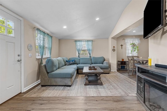 4673 Mill Stream Ct, Murrysville, PA 15668 - living area with wood finished floors, recessed lighting, and vaulted ceiling