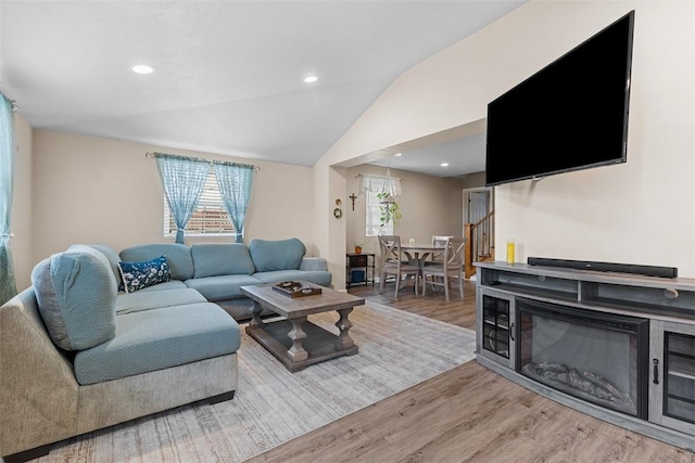 4673 Mill Stream Ct, Murrysville, PA 15668 - living room with lofted ceiling, wood finished floors, and recessed lighting