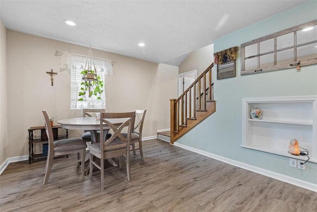 4673 Mill Stream Ct, Murrysville, PA 15668 - dining area featuring wood finished floors, stairs, recessed lighting, and built in shelves