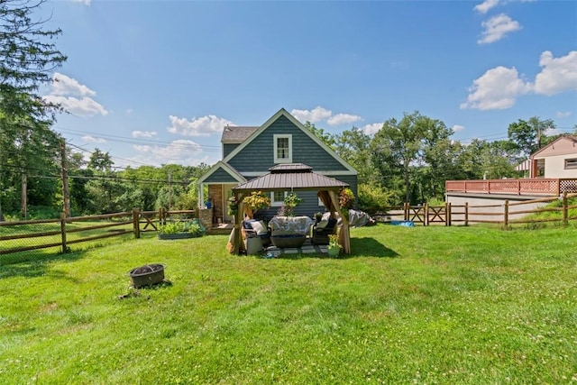 4673 Mill Stream Ct, Murrysville, PA 15668 - fenced backyard with a gazebo and an outdoor living space with a fire pit