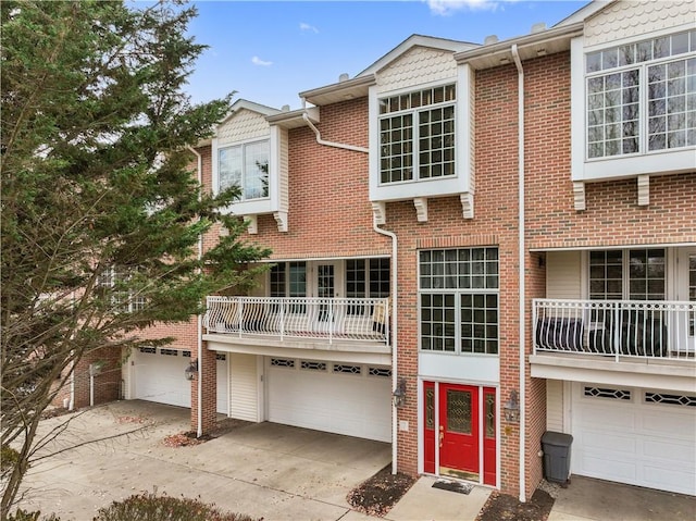 740 Turnpike St Unit 7, Beaver, PA 15009 - view of front of property featuring concrete driveway, a balcony, and brick siding