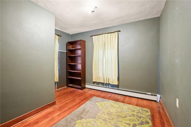 769 Russell Ave, Greater Johnstown School District, PA 15902 - unfurnished room featuring a baseboard radiator and wood finished floors