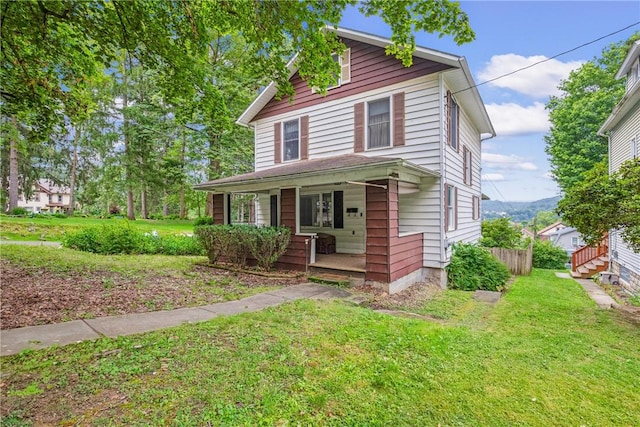 769 Russell Ave, Greater Johnstown School District, PA 15902 - view of front of house with a porch and a front lawn