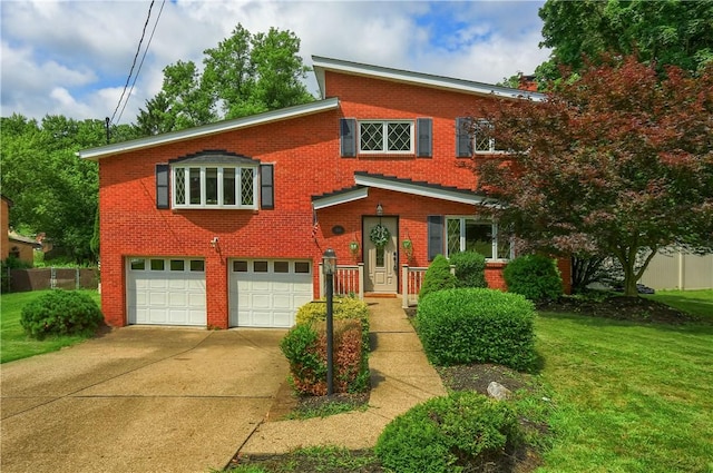 2116 Stewart Rd, South Park, PA 15129 - view of front of property with brick siding, a garage, and concrete driveway