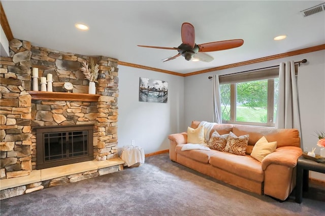 2116 Stewart Rd, South Park, PA 15129 - carpeted living room with crown molding, a ceiling fan, a stone fireplace, and recessed lighting