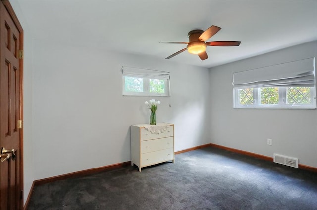 2116 Stewart Rd, South Park, PA 15129 - unfurnished bedroom featuring dark carpet and a ceiling fan