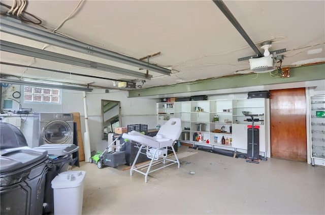 2116 Stewart Rd, South Park, PA 15129 - garage featuring a garage door opener and washer / dryer