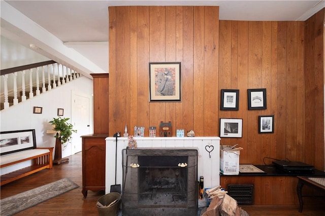 2507 Duncan Ave, Hampton, PA 15101 - living room with a fireplace, wood finished floors, and wood walls
