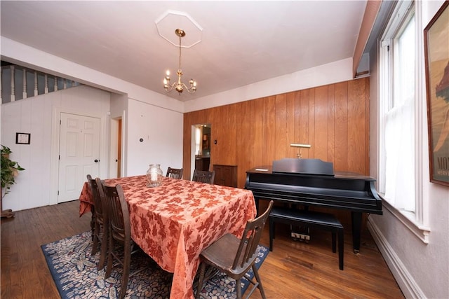 2507 Duncan Ave, Hampton, PA 15101 - dining space with a chandelier, wood finished floors, and wooden walls