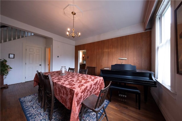 2507 Duncan Ave, Hampton, PA 15101 - dining area with a chandelier, dark wood-style floors, and wooden walls