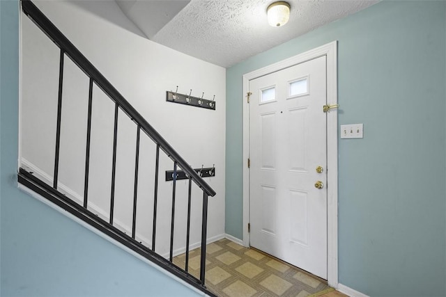 301 Laporte Ct, Cranberry Twp, PA 16066 - entrance foyer featuring a textured ceiling and stairs